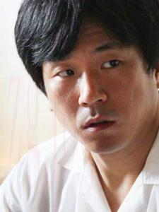 梁同志