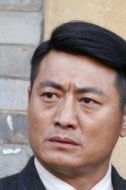 甄志成